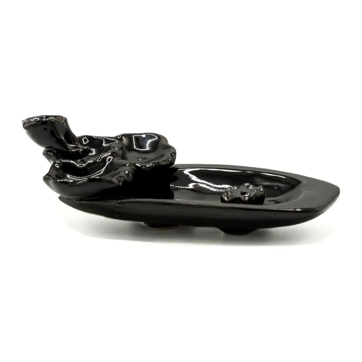 Ceramic backflow incense burner with flowing smoke