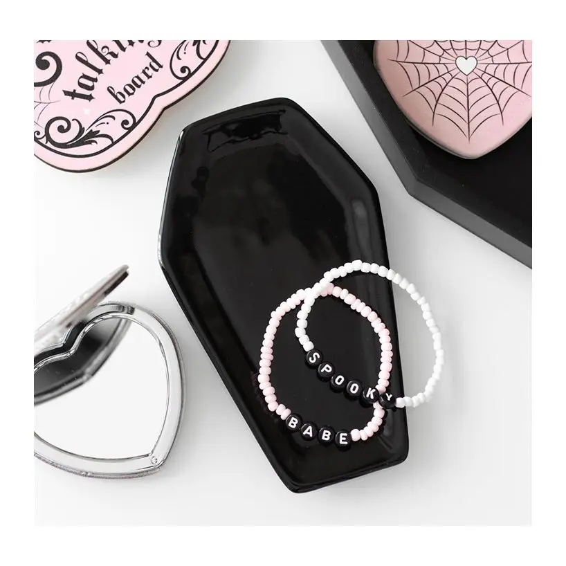 Black coffin-shaped trinket tray