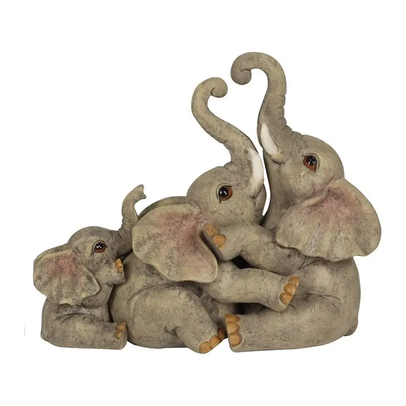 Resin ornament of two elephants cuddling their baby