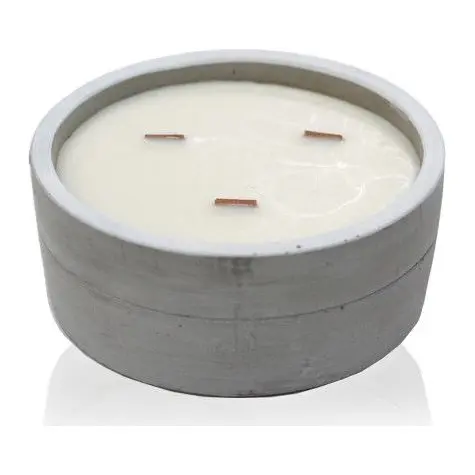 Large round concrete candle with a wooden wick