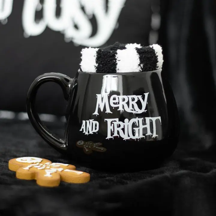 Black Merry and Fright mug with striped socks