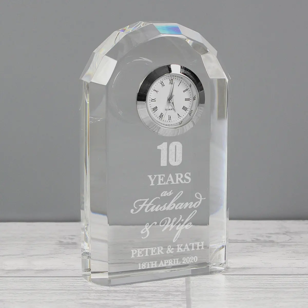 Crystal anniversary clock personalised with years as husband and wife