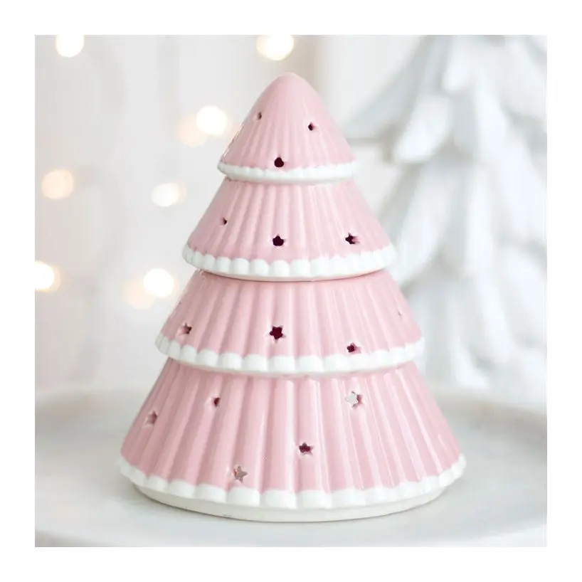 Pink Christmas tree oil burner with star cut-outs